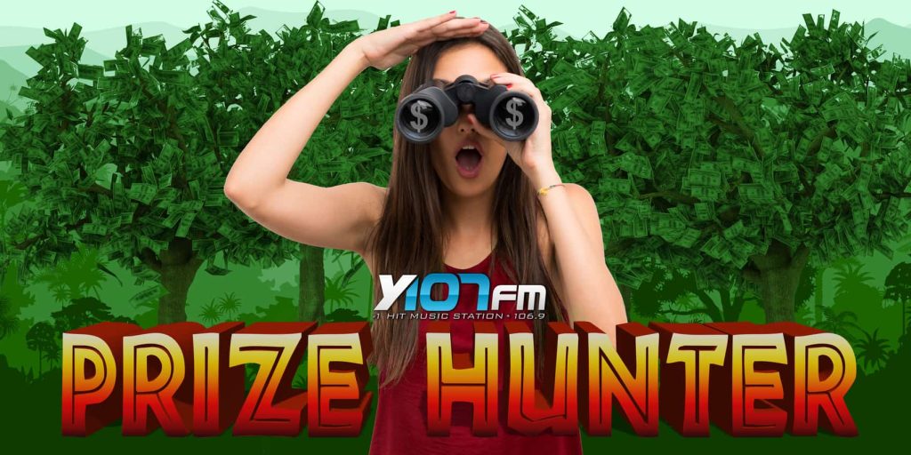 Girl with binoculars on the search with Prizehunter underneath her