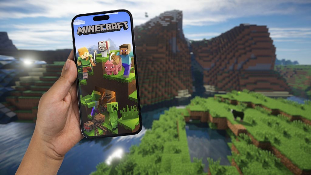 child,holding,a,smartphone,iphone,14,pro,with,minecraft,mobile